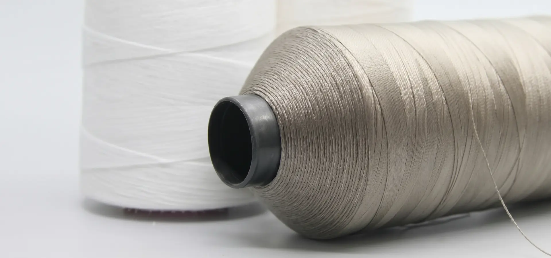 ໂຮງງານຕັດຫຍິບ Polyester Filament Thread